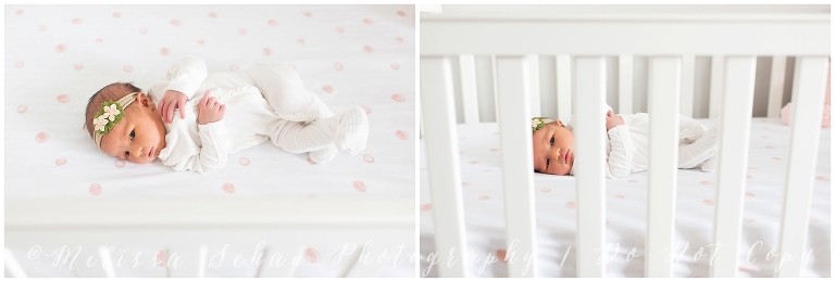 Newborn lying in crib for lifestyle photography session