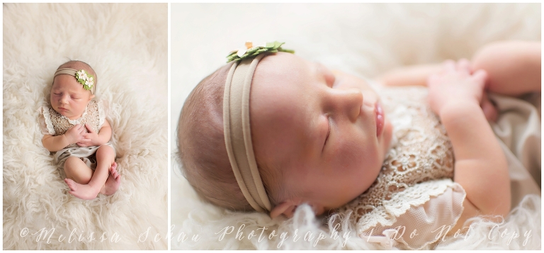Sleeping newborn baby girl photo session