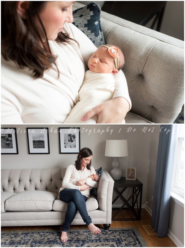 Mother holding newborn daughter