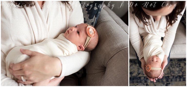 Mom holding newborn daughter