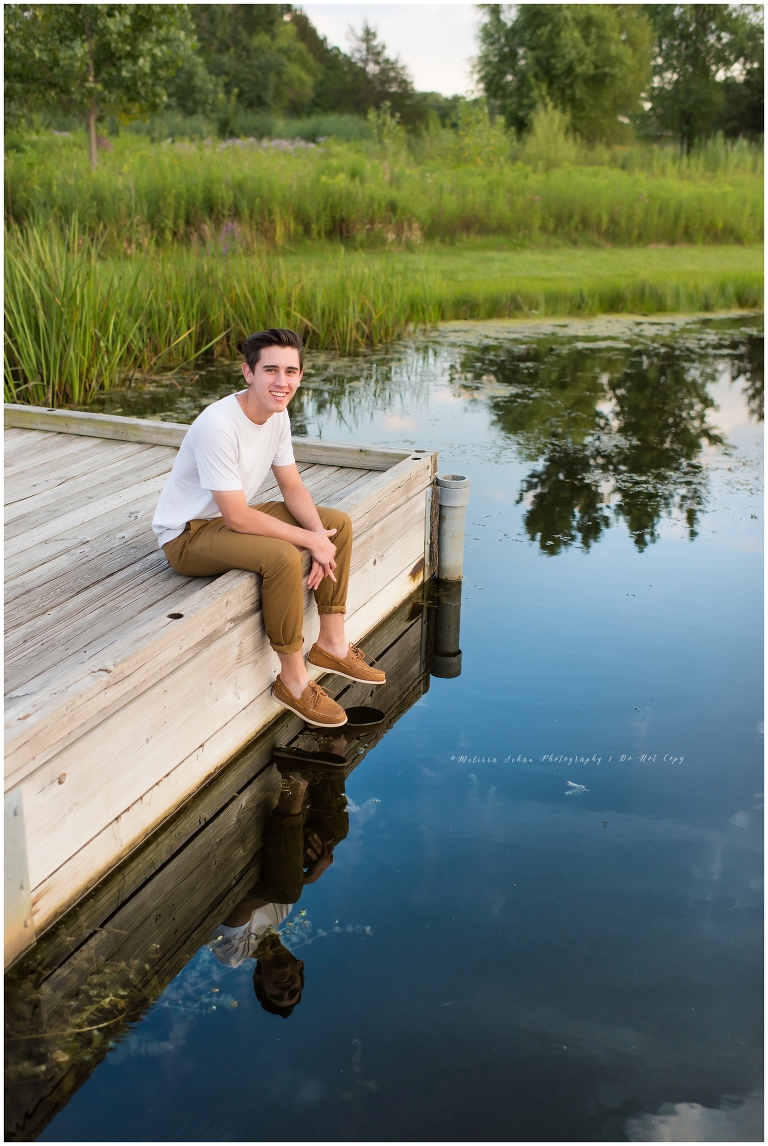 Barrington Illinois high school senior boy photography session sitting on dock