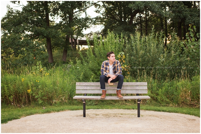 Barrington Illinois high school senior guy sitting on bench for photography session