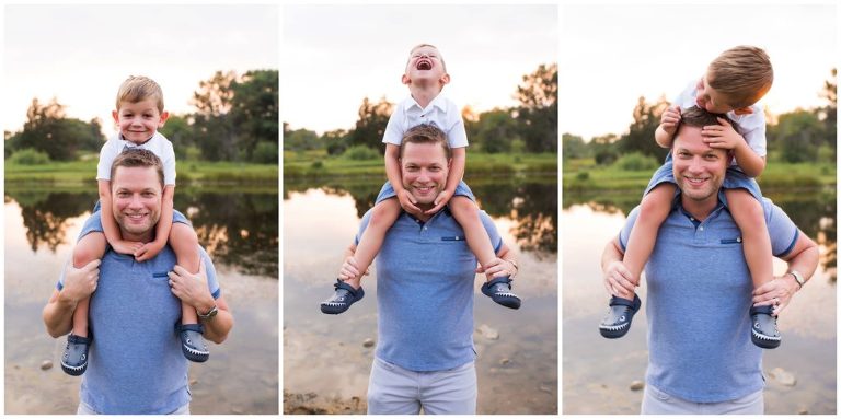 Boy laughing while sitting on dad's shoulders